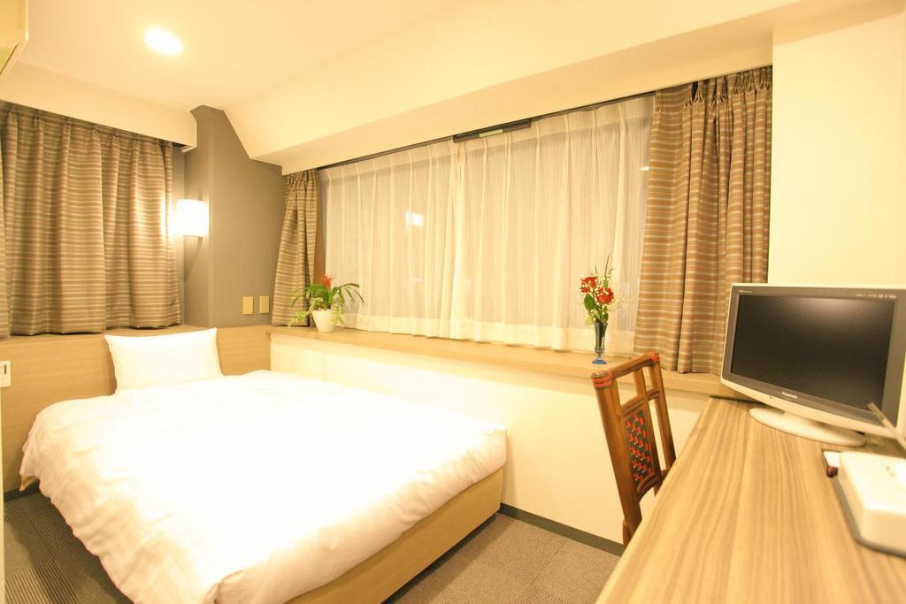 Hotel Marutani Токио Номер фото